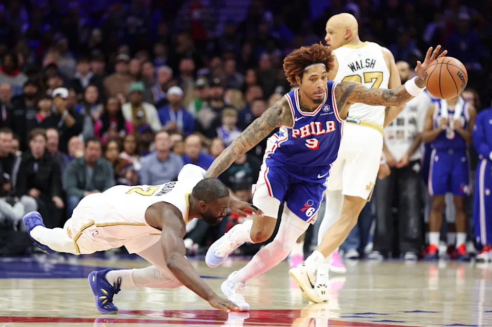 Nov 11, 2025; Philadelphia, Pennsylvania, USA; Philadelphia 76ers guard Kelly Oubre Jr. (9) goes for a loose ball in front of Boston Celtics guard Jaylen Brown (7) during the fourth quarter at Xfinity Mobile Arena. Mandatory Credit: Bill Streicher-Imagn Images