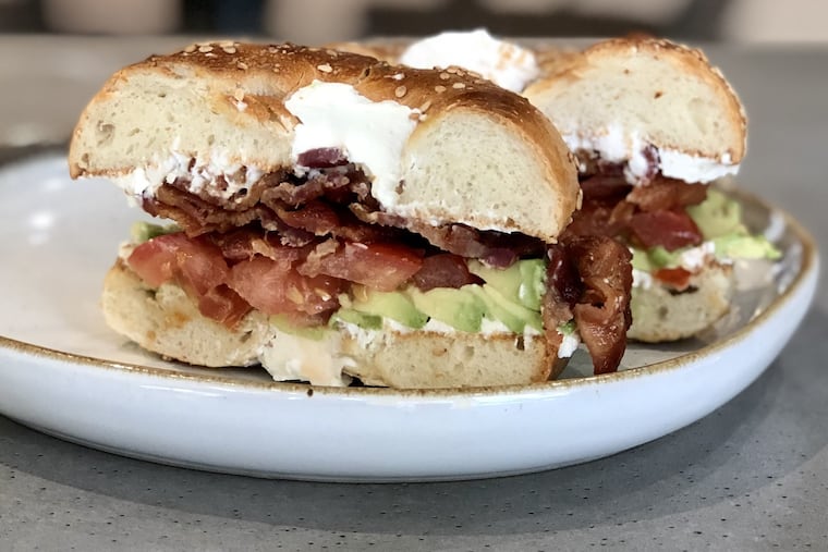 A breakfast sandwich on bagel at Eggcellent.