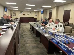 First responders, right, talk about how their departments use Utility Task Vehicles to respond to emergencies. (Photo by Whitney Downard/Pennsylvania Capital-Star)