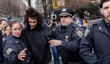 A left-wing protester is arrested after throwing what appears to be a homemade explosive device at a demonstration held by far-right influencer Jake Lang outside Gracie Mansion in New York City, on March 7, 2026. (Photo by Matthew Hoen/NurPhoto via AP)
