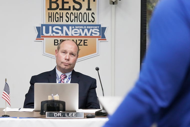 Bensalem Superintendent Samuel Lee listens to Rush Elementary School teacher Justin Ellis during a June 2018 school board meeting.