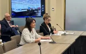 At left, Melissa Melewsky, an attorney with the Pennsylvania News Media Association, describes public access barriers before a committee on March 23, 2026. (Photo by Whitney Downard/Pennsylvania Capital-Star)