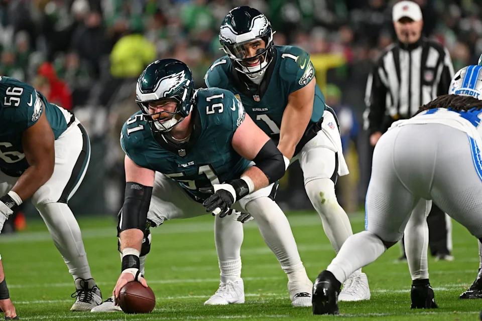 Nov 16, 2025; Philadelphia, Pennsylvania, USA; Philadelphia Eagles quarterback Jalen Hurts (1) takes the snap from center Cam Jurgens (51) against the Detroit Lions at Lincoln Financial Field. Mandatory Credit: Eric Hartline-Imagn Images