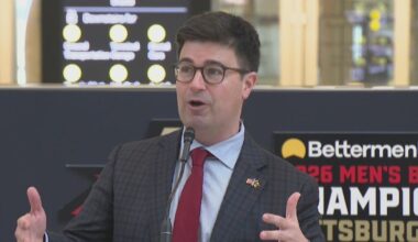 Mayor Corey O'Connor speaks to students as police continue to investigate scanner threats