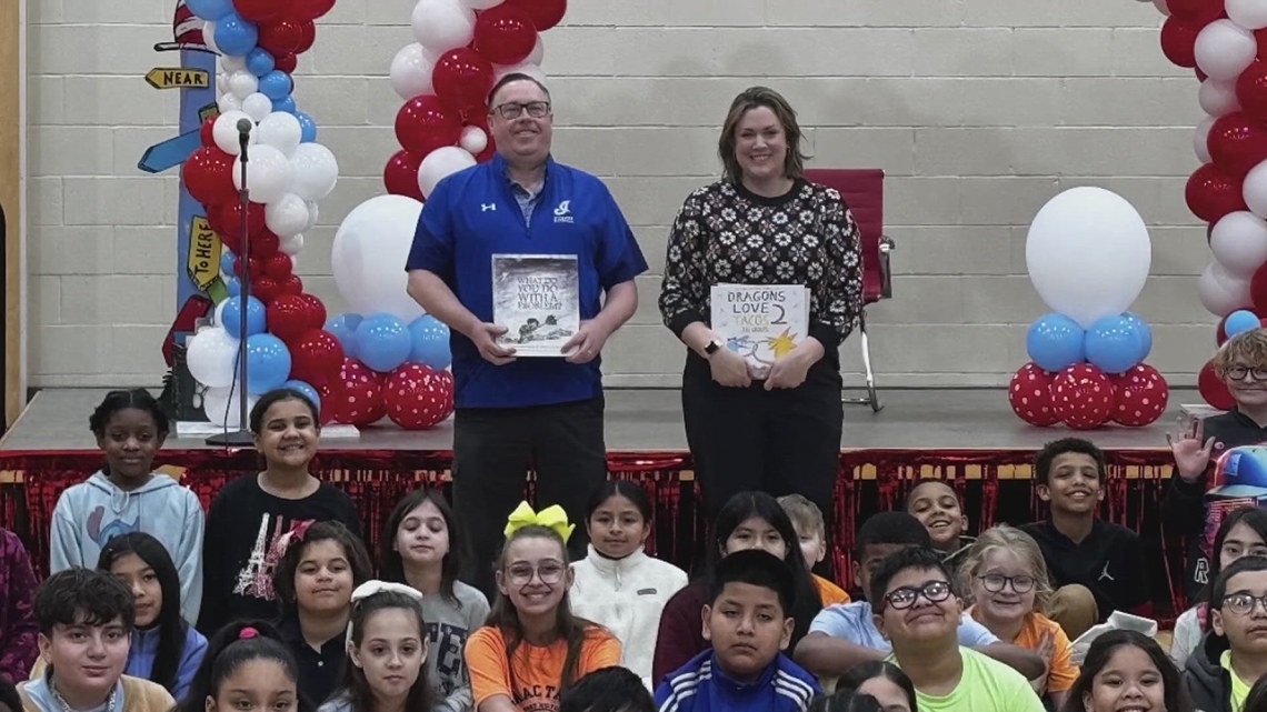 Stacy and Steve read to students in Scranton