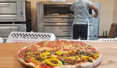 A pizza, hot from the oven, at Vince's Pizzeria, 965 Frankford Ave. in Fishtown.