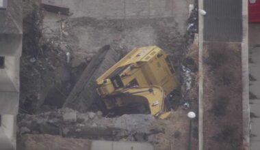 Excavator falls at Courthouse Square demolition in Washington, Pa.