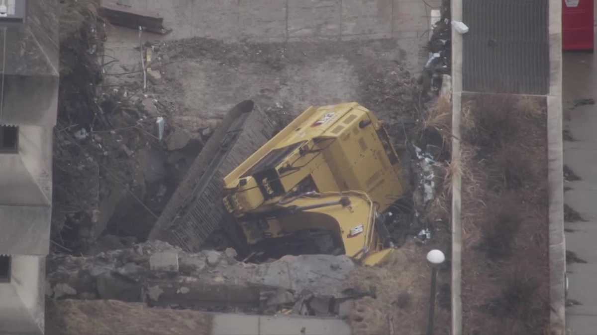 Excavator falls at Courthouse Square demolition in Washington, Pa.