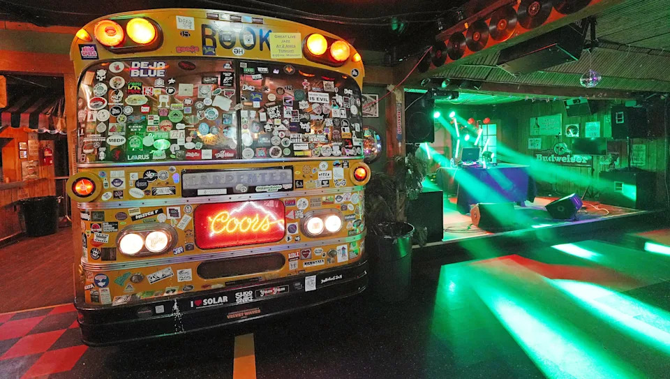 The front of a full-sized bus sits next to the upstairs stage at the King's Rook Club in Erie, Pa., on Feb. 20, 2026.