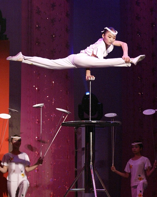 The Peking Acrobats will perform balancing feats at the University of Pennsylvania. (Associated Press)