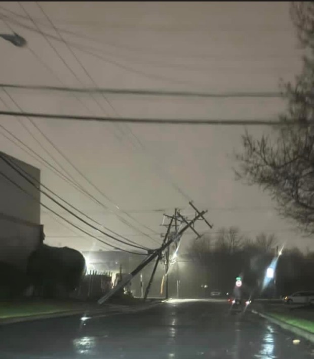 A screenshot from an Albright College security camera shows a toppled utility pole that damaged power lines, knocking out power to the campus Tuesday morning. (Courtesy of Albright College)