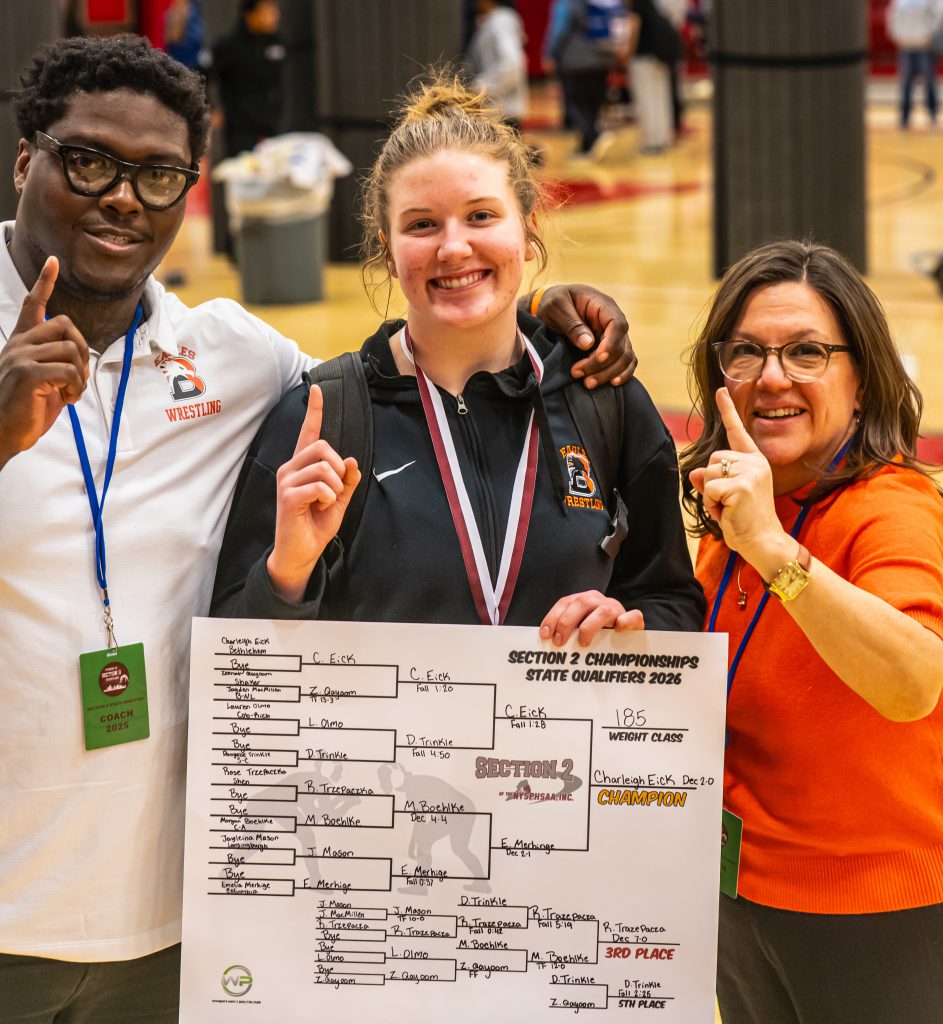 three people hold up number one signs with fingers