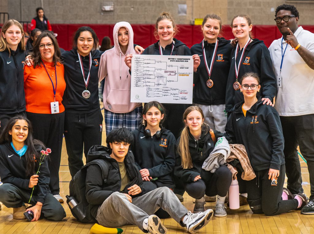 group of people pose for photo