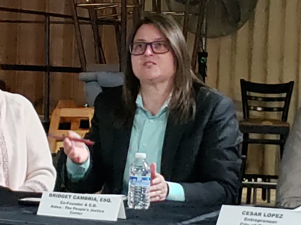 Immigration attorney Bridget Cambria, founder and executive director of ALDEA - The People's Justice Center, speaks Wednesday at a town hall meeting focused on the Dignity Act of 2025. (MICHELLE LYNCH - READING EAGLE)