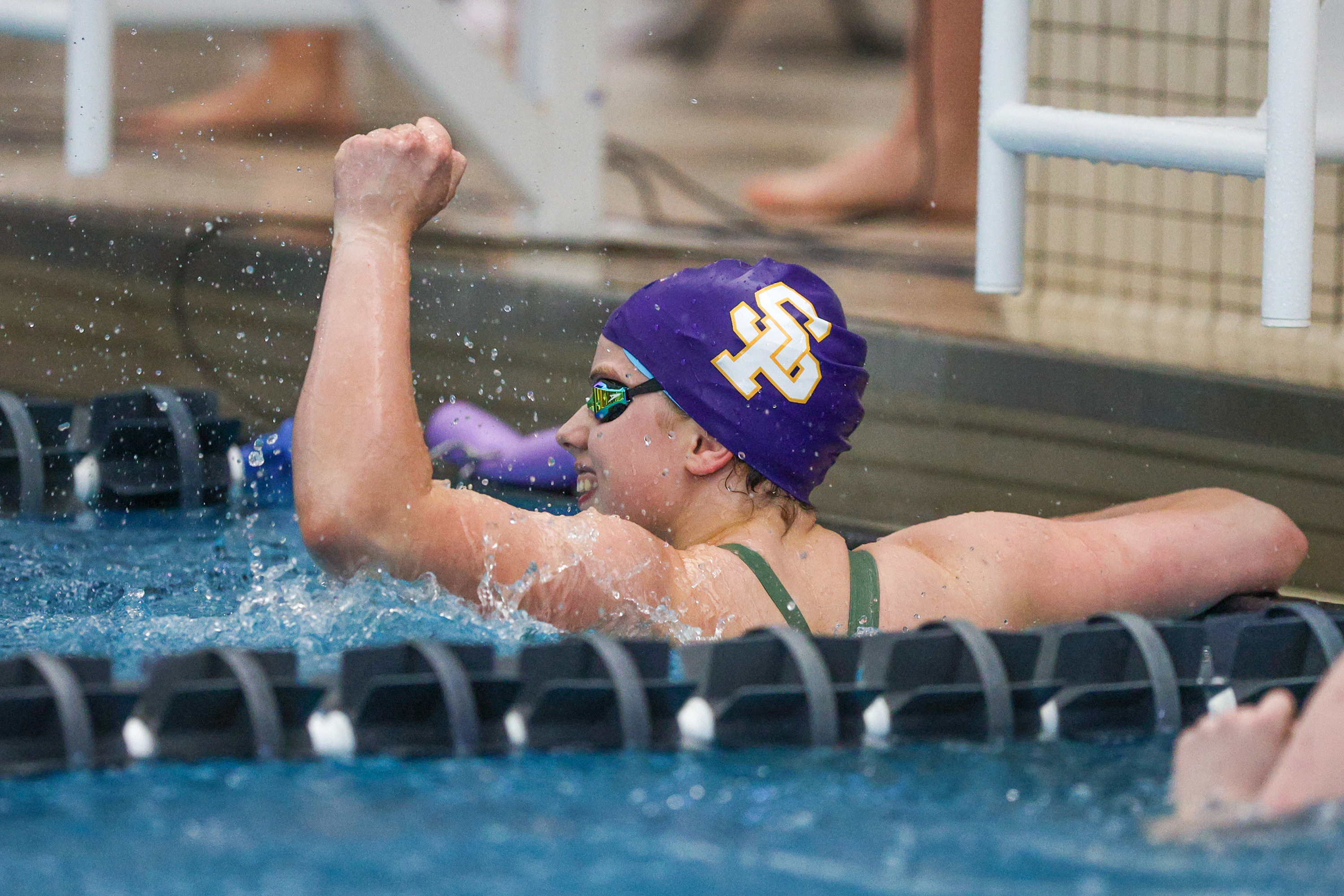 Scranton Prep’s Rebecca Oakes celebrates after winning the 100 freestyle...