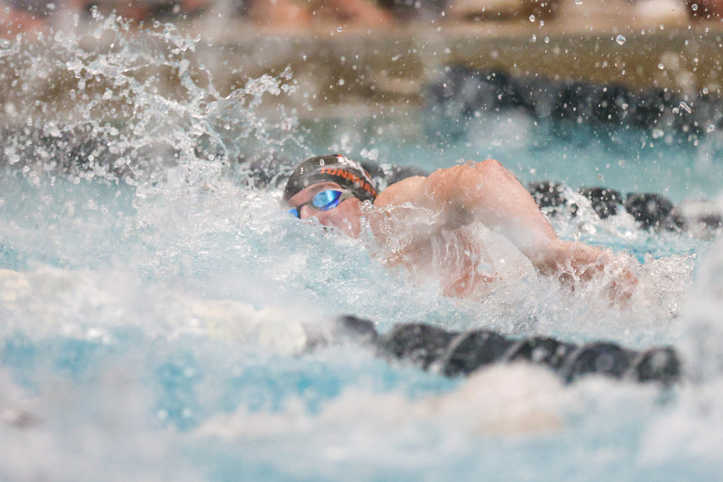 Tunkhannock Area’s Kyle Kozloski competes in the 100 freestyle during...