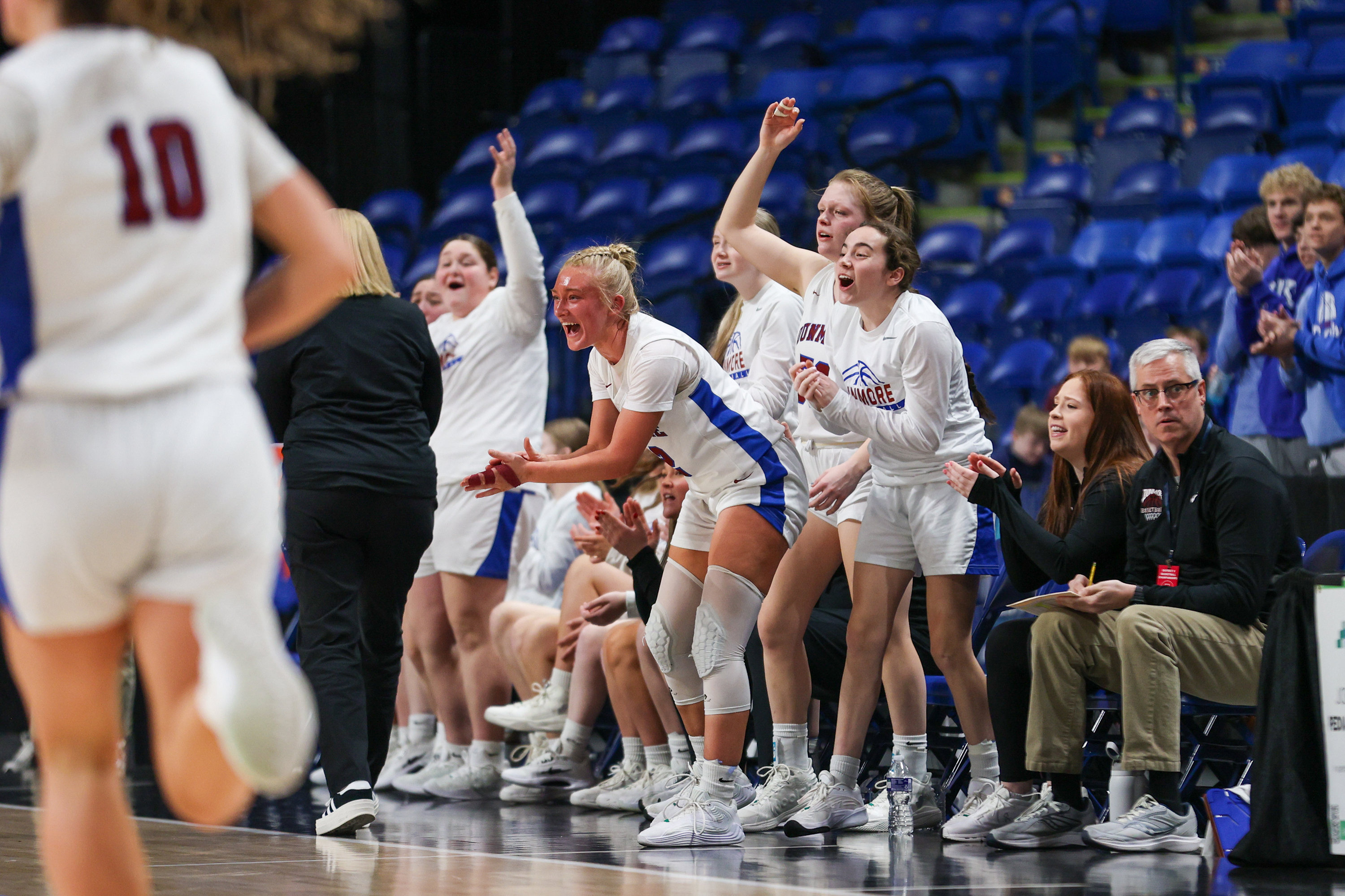 Dunmore’s bench celebrates after scoring during the District 2 Class...