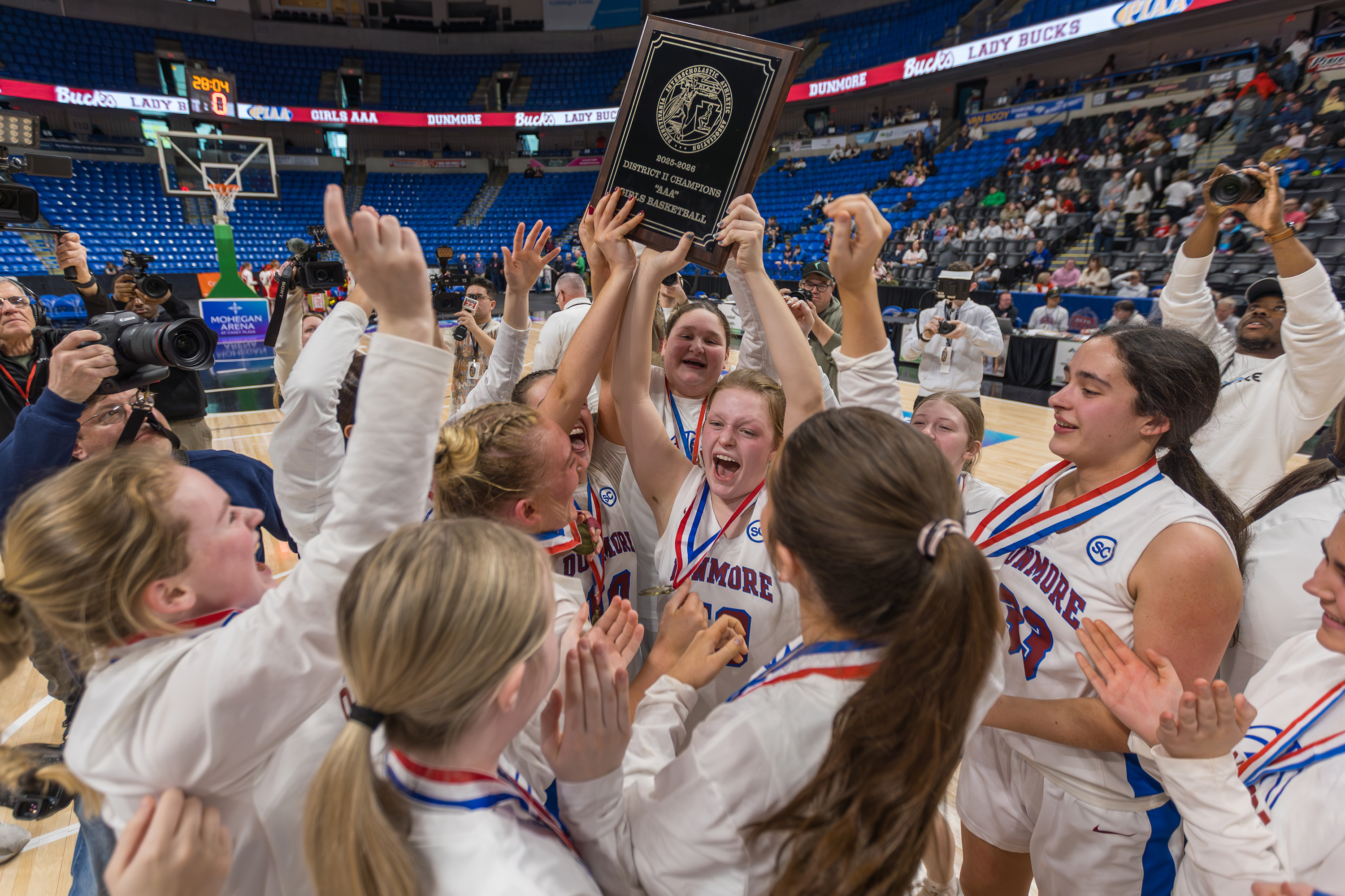 Dunmore celebrates after winning the District 2 Class 3A girls...