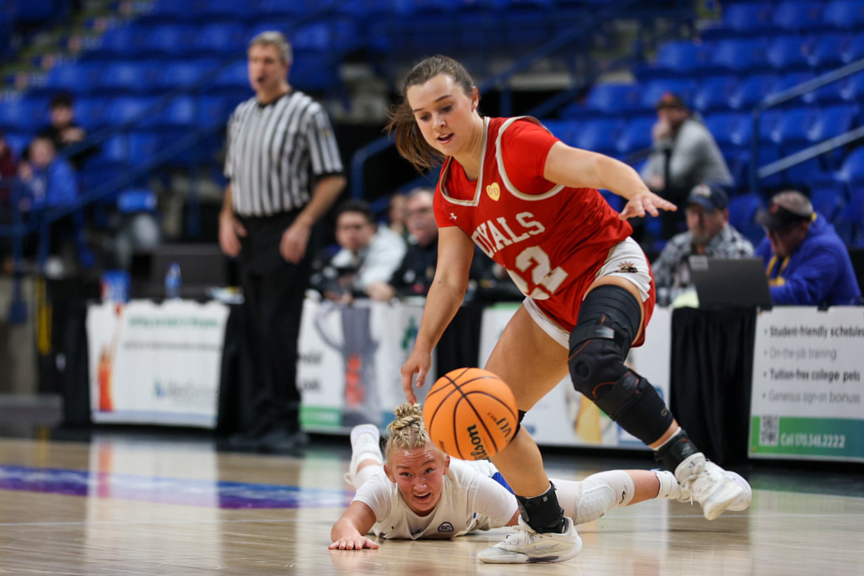 Holy Redeemer’s McKenzie Chimock (22) chases after a loose ball...