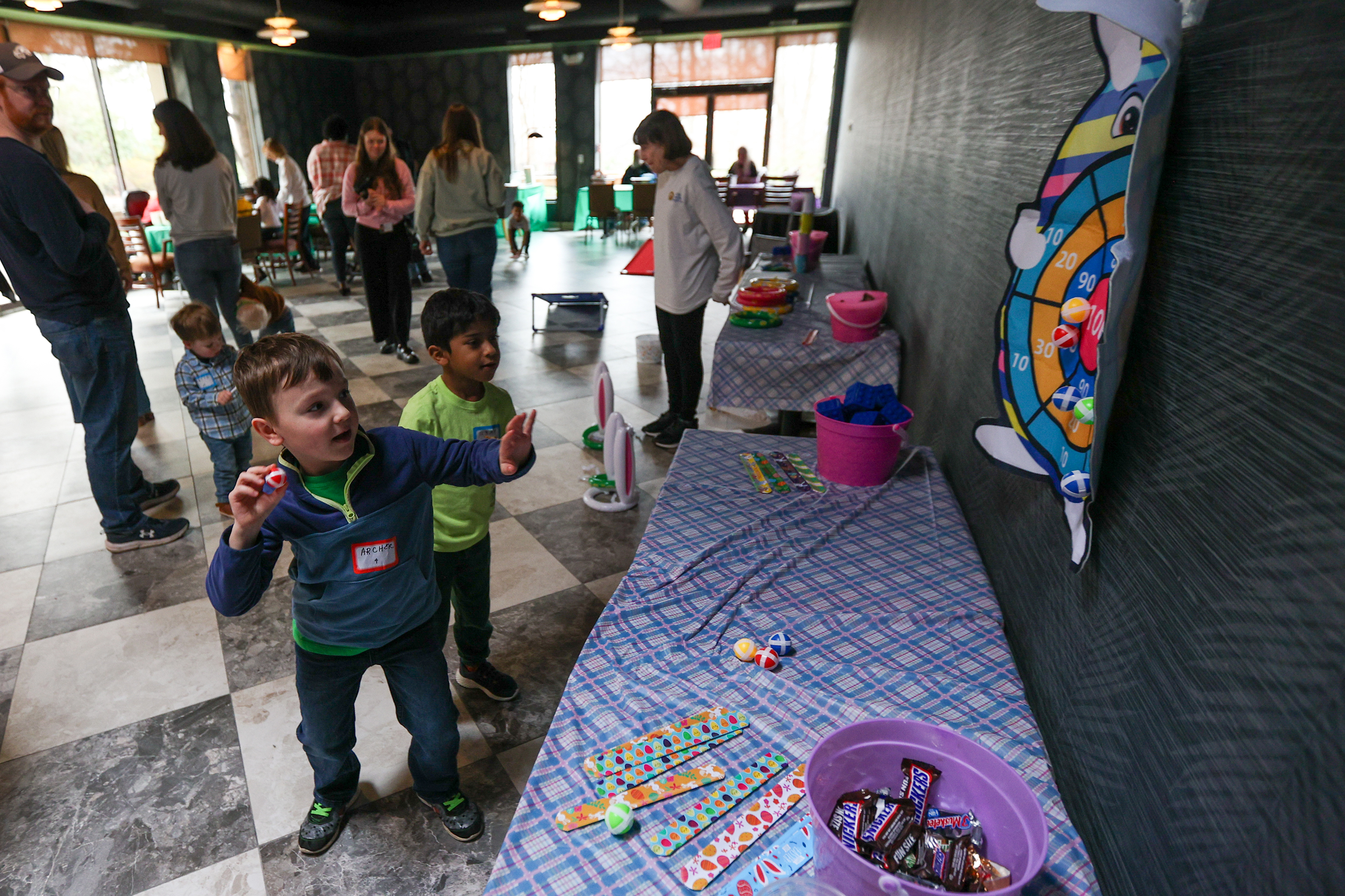 Archer Ruseskas, 6, of Swoyersville, prepares to throw a velcro...