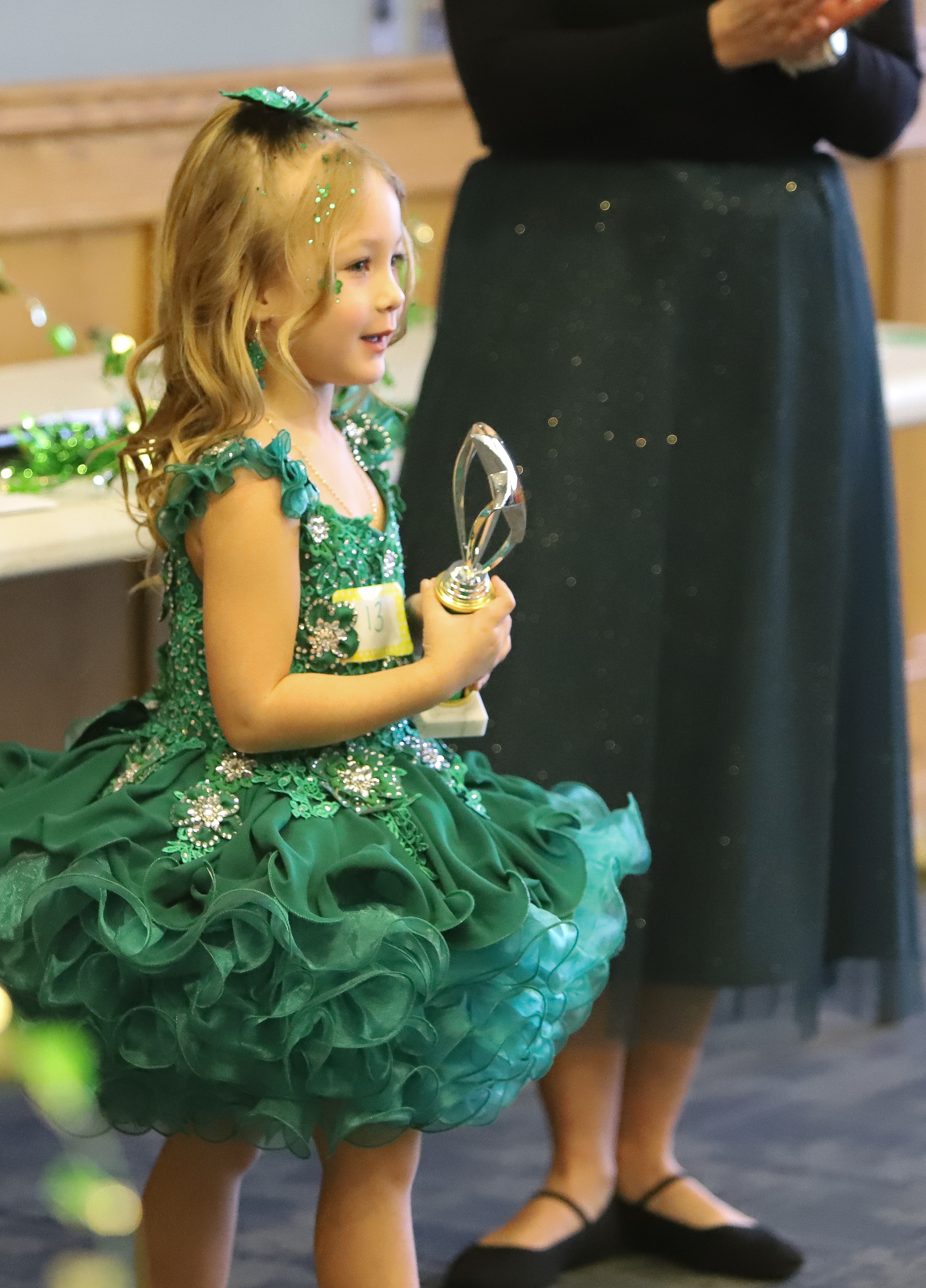 Little Miss first runner up Vivienne Ruth Dante receives her...