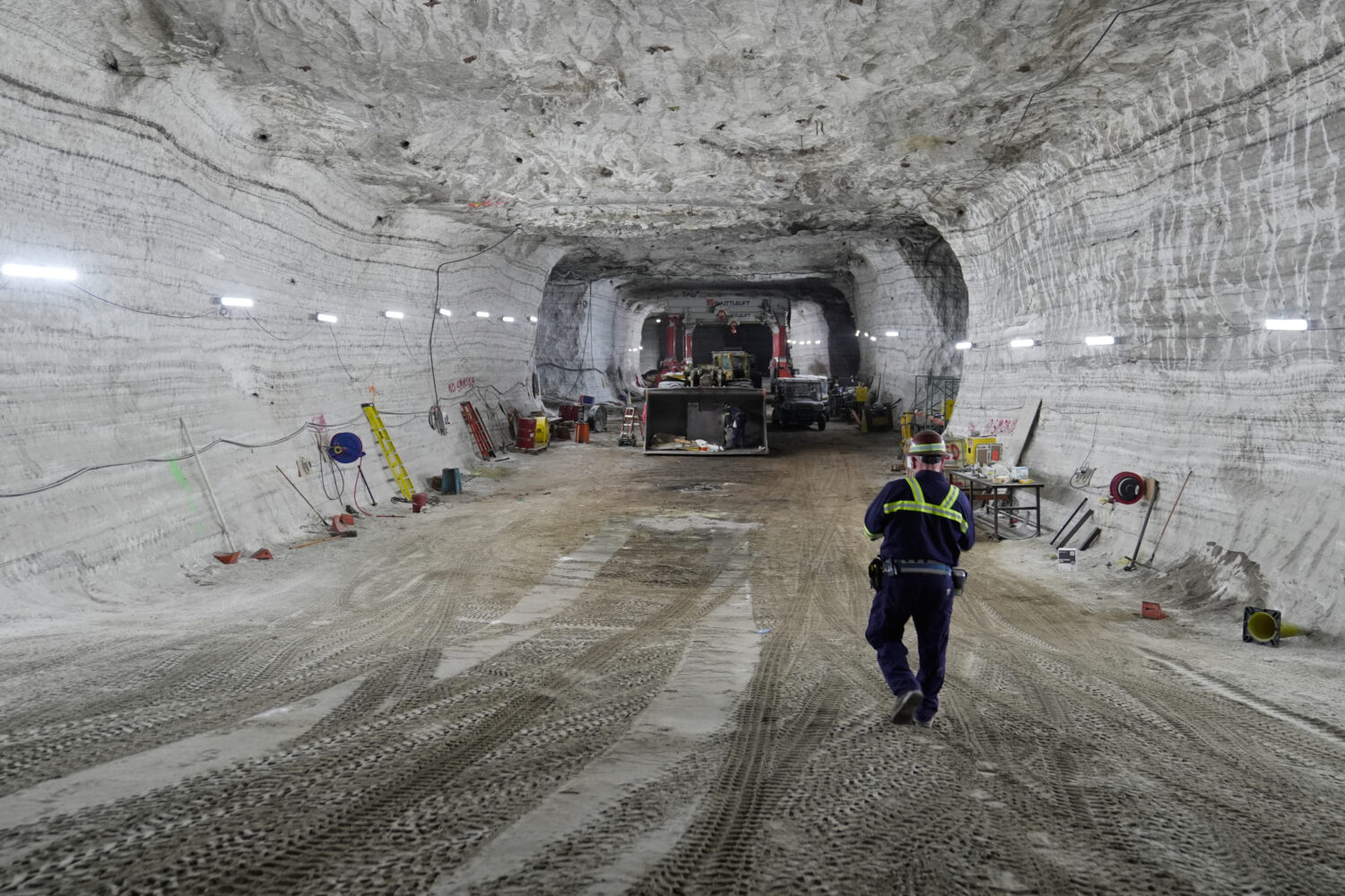 George Campbell, maintenance supervisor, walks down an incline in the shop at the Cargill salt mine...