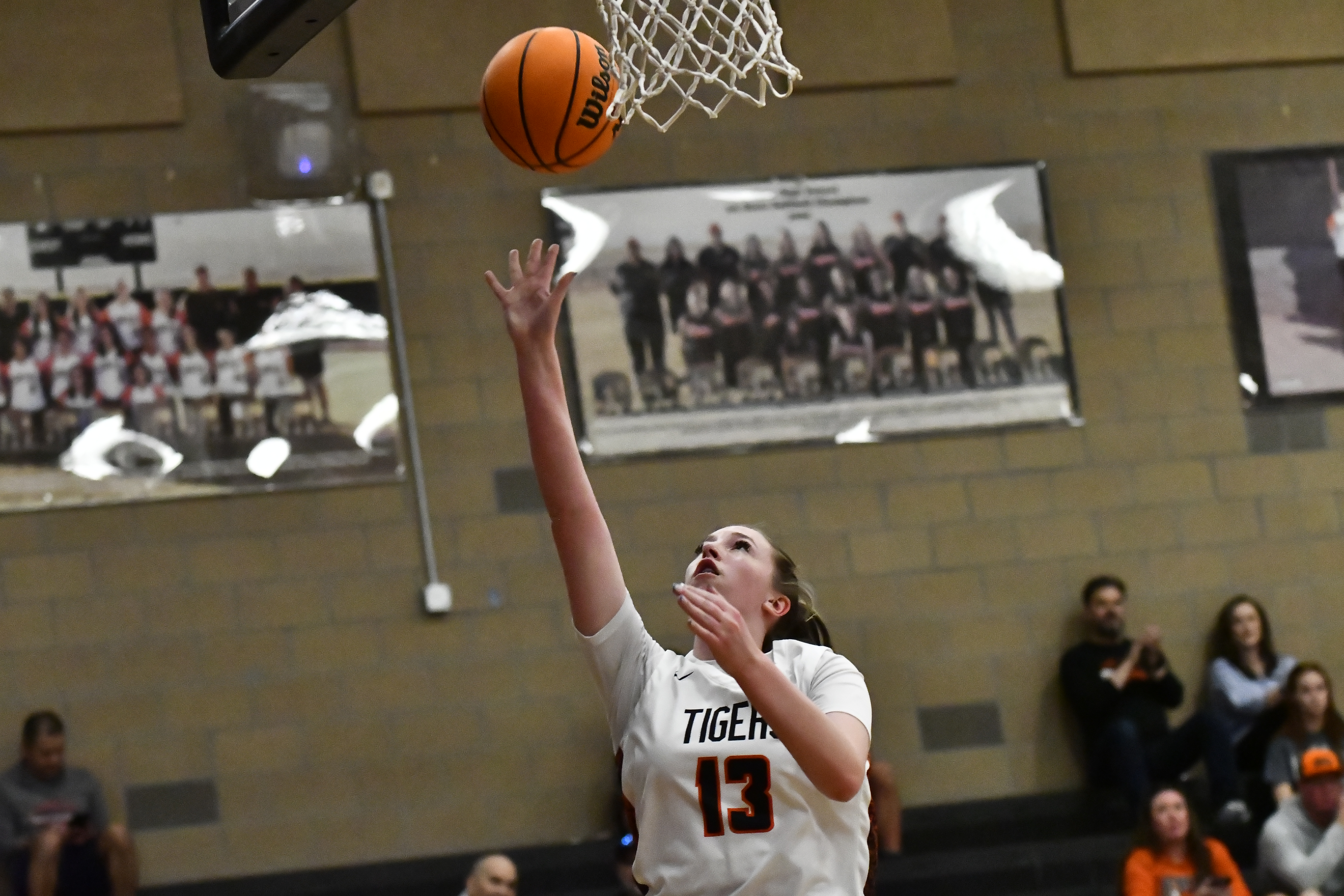 Erie's Sophie Tusk takes a layup during the Tigers' playoff...