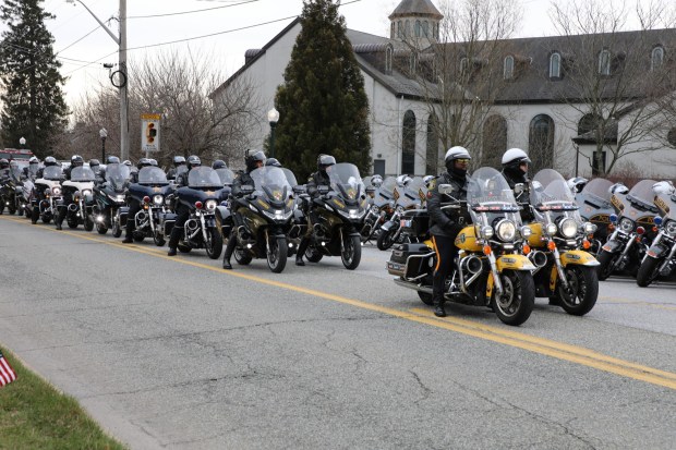 Wednesday morning, New Jersey police from the City of Newark arrive at Saint Joseph Roman Catholic Parish in Downingtown to honor slain Pennsylvania State Police Corporal Timothy O'Connor Jr. (Jen Samuel Daily Local News)