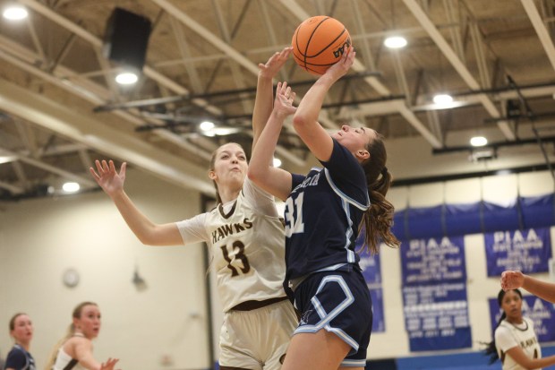 Villa Maria's Becca Croft's shot gets blocked by Bettlehem Catholic's Kendall Nickischer on Wednesday. Tom Silknitter - For MediaNews Group