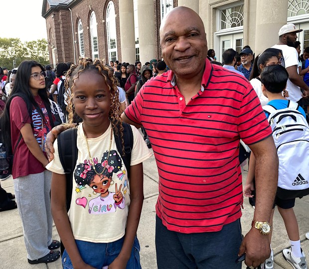 Germina Sampaio with her father, Comi Sampaio, at Beverly Hill Middle School in Upper Darby. (PETE BANNAN-DAILY TIMES)