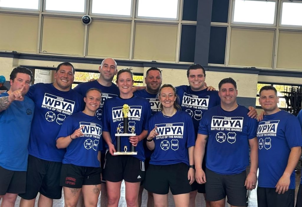 Upper Darby police and firefighters battle in basketball game for charity