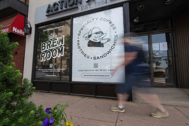 A pedestrian passes by the Brew Room in Ardmore, Pa., on Monday, June 23, 2025. The eatery is currently under construction.