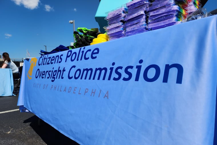 A sign with the logo for Philadelphia's Citizens Police Oversight Commission, the city's independent police watchdog agency.