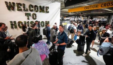 Airline passengers wait in long lines outside the terminal to get through the TSA security screening at William P. Hobby Airport in Houston, Sunday, March 8, 2026.
