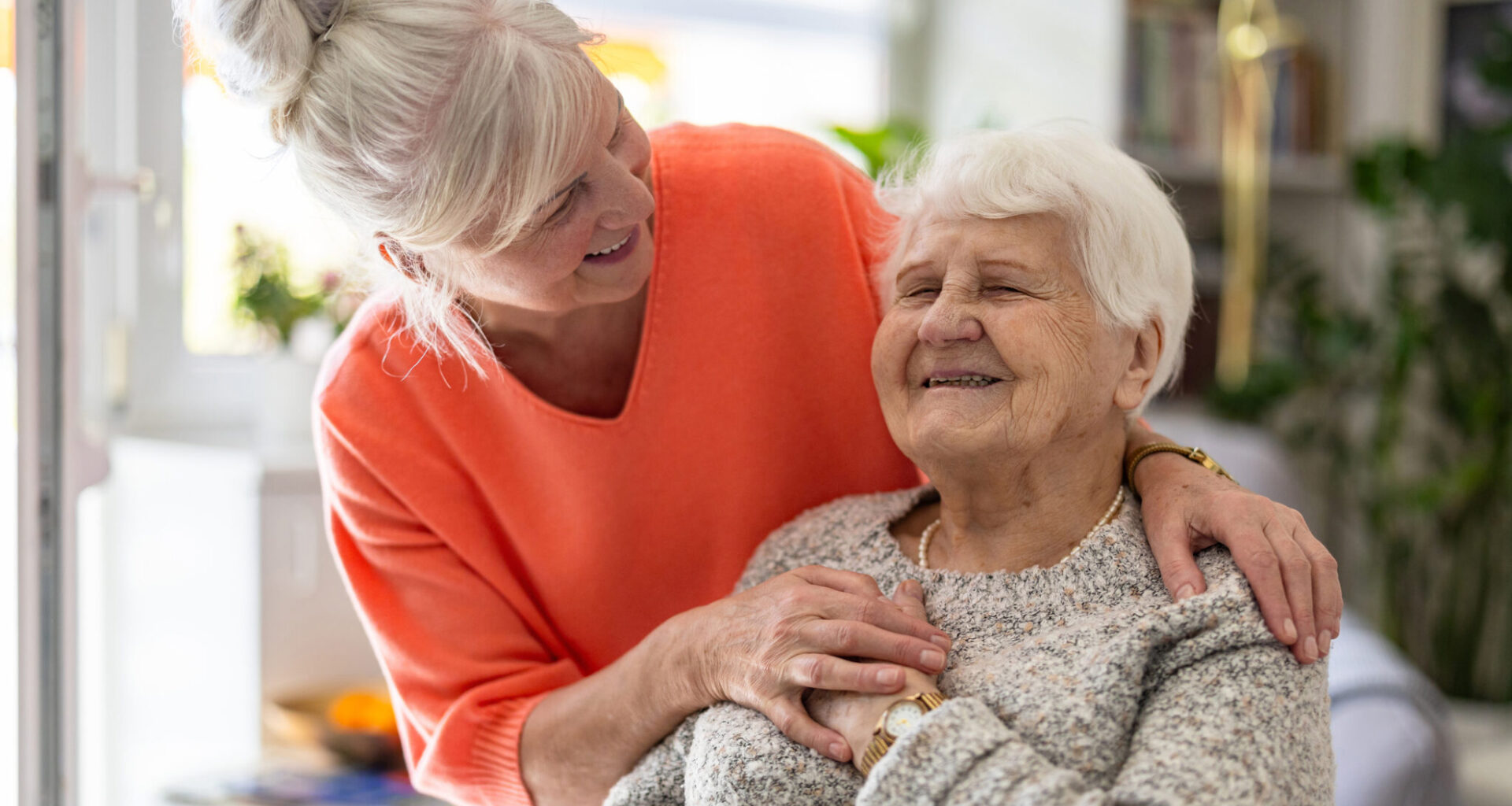 Preparation for blood test with senior woman by female doctor medical uniform on the table in white bright room. Nurse pierces the patient’s arm vein with needle blank tube.