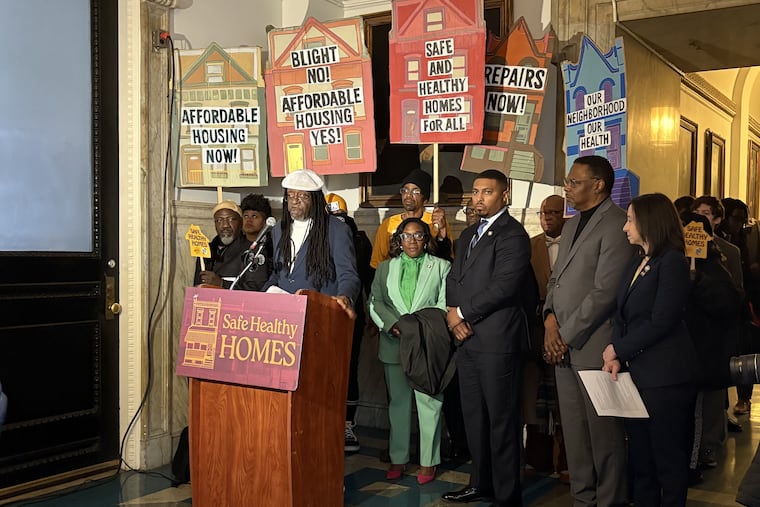 Cincere Wilson, a renter at the Upsal Garden apartment complex in Mount Airy, talks about how his living room ceiling collapsed last year during a Feb. 19 news conference at City Hall organized by City Councilmember Nicolas O'Rourke in support of his Safe Healthy Homes Act.