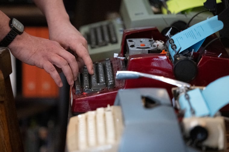Bill Rhoda types on a vintage typewriter at his shop, Philly Typewriter, on Friday, Jan. 9, 2026, in Philadelphia. A recent customer flew a typewriter to the city for an extensive repair.