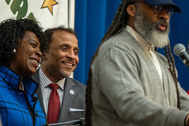 Mayor Cherelle L. Parker is with school superintendent Tony B. Watlington, Sr. (center) at McDaniel Elementary School Monday, March 23, 2026 as Reginald Streater, president of the Board of Education speaks during announcement of the Mayor’s proposed $1-per-ride Uber and Lyft tax to help bail the Philadelphia School District out of a budget deficit.