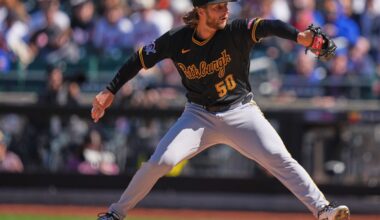 Pirates hold on in extras, defeat Mets for first win of season