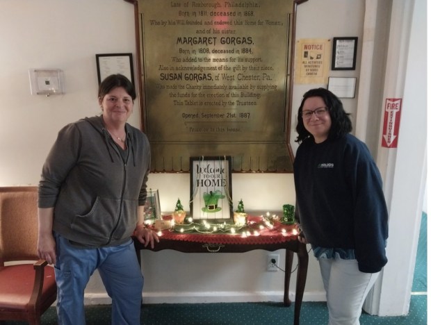 RHW staffers Blair, left, and Lainey hosted Irish themed festivities that put smiles on the resident's faces. (Photo courtesy of Roxborough Home For Women)