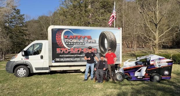 Steven McLaughlin, center, with Jerry Katz, owner of Katzy's Mobile Tire Service and sponsor of McLaughlin's race car, and Dylan Cordier, who has taken over driving McLaughlin's race car since a 2023 workplace accident left McLaughlin paralyzed. (Courtesy of Steven McLaughlin)