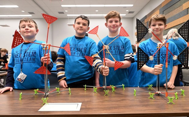 Fourth grade students from Conrad Weiser West Elementary School stand with their windmill project at the 12th annual Berks County Intermediate Unit's STEM Design Challenge at the UGI Training Center, 1049 Stinson Drive, Bern Township, on Tuesday, March 17, 2026. They are, from left, Dexter Bessler, 10; Ryder Ulrich; 10; Jackson Reinert, 10; and Cale Oberlin, 11. (BILL UHRICH/READING EAGLE)