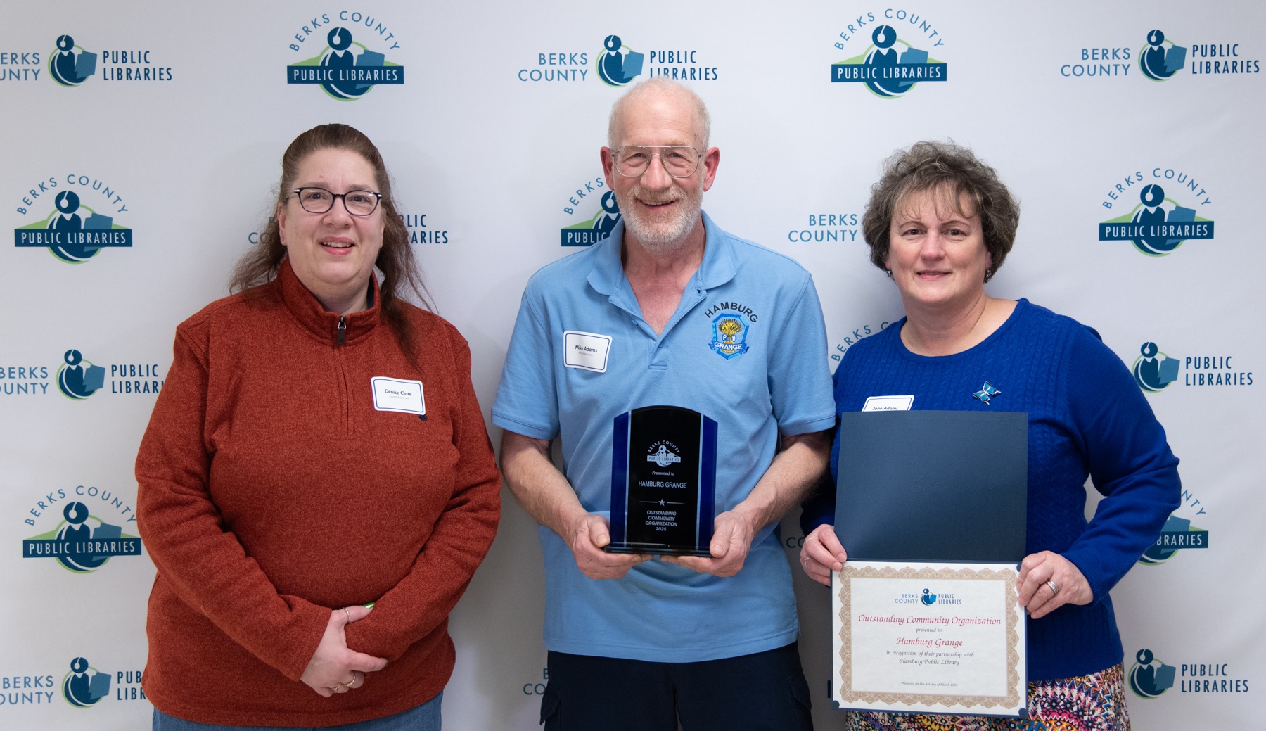 Members of the Hamburg Grange accept the Outstanding Community Organization...