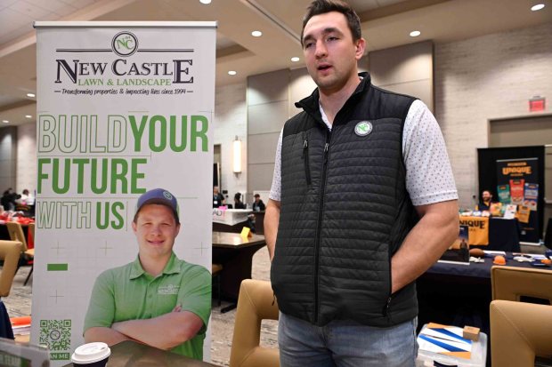 Zach Gardner, landscape designer, talks about opportunities with New Castle Lawn and Landscaping. (BILL UHRICH/READING EAGLE)