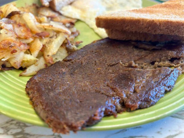 The proof of Dietrich's scrapple is in the eating at the Quality Shoppe restaurant in Kutztown. (BILL UHRICH/READING EAGLE)