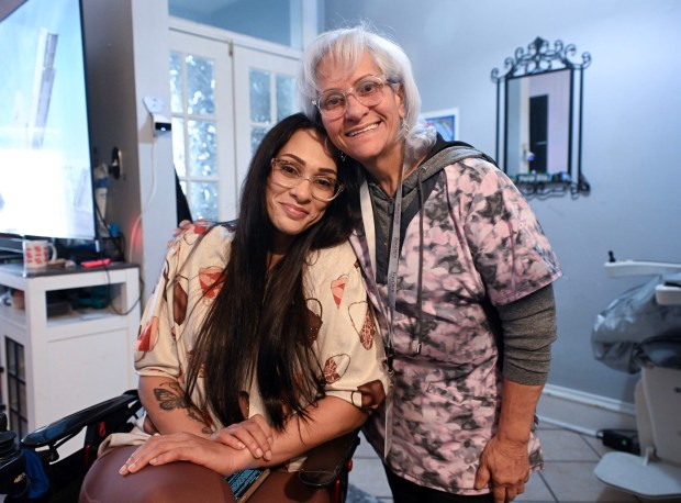 Noemi Gonzalez, left, has had to rely on her mother, Judith Haddock, for much of her home care. (BILL UHRICH/READING EAGLE)