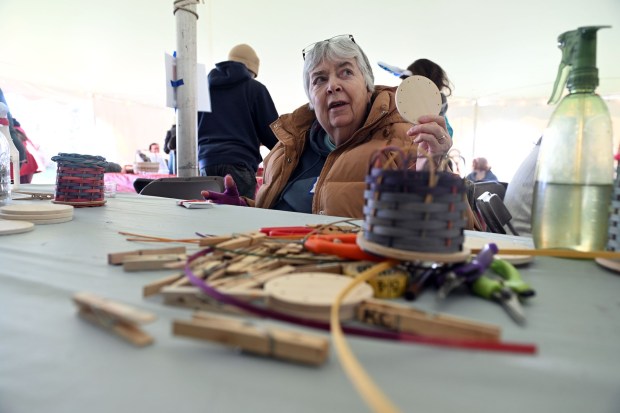 Debbi Zvanut of New Tripoli leads a children's basketmaking workshop during the Easter on the Farm celebration at the Pennsylvania German Cultural Heritage Center at Kutztown University on Saturday, March 28, 2026. (BILL UHRICH/READING EAGLE)