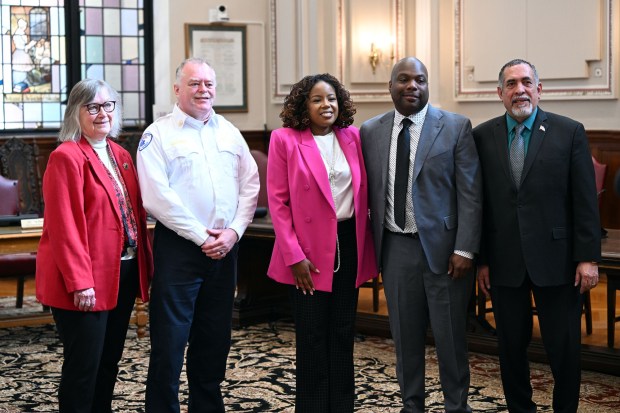 The new city fire chief was introduced by Reading Mayor Eddie Moran at a City Hall news conference on Tuesday, March 24, 2026. From left are: City Council President Donna Reed, 1st Deputy Fire Chief David Williams; Morgan Leonard, the chief's wife; Chief Robert Leonard II; and the mayor. (BILL UHRICH/READING EAGLE)