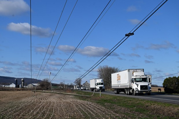Poles downed by strong winds along Route 222 in Kirbyville on Tuesday morning. (Bill Uhrich - Reading Eagle)