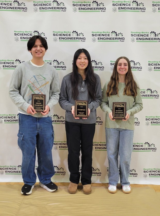 Winners of the 2026 Reading-Berks Science and Engineering Fair senior division, from left, William Ferenchick, Wilson High School, grand champion; Heidi Ding, Wilson High School, champion; and Scarlet Neider, Conrad Weiser High School, reserve champion. (Courtesy of Gregory Przyjemski)